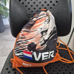 Zaino Zwart oranke max verstappen, come riportato da Arriva Twents utilizzando iLost