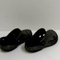 Zapato Crocs, segundo informou Bobbejaanland usando iLost