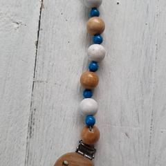 Tettarella met houten kralen ketting, come riportato da DierenPark Amersfoort utilizzando iLost