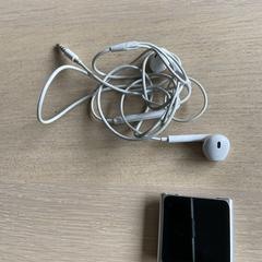 iPod nano zilvergrijs met oortjes, som rapporterats till iLost