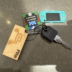 Fietssleutel met game sleutelhanger. Flip, iLost에 보고됨