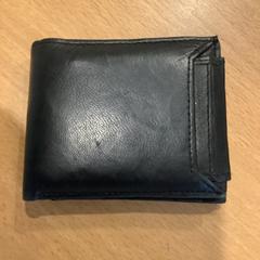 Wallet op naam van Charnley, as reported by Gemeente Amsterdam using iLost