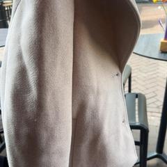 Coat, as reported by Club Nyx/Exit Café using iLost