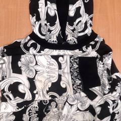 Children's sweter, jak nahlášeno Grand Hotel Amrath Kurhaus pomocí iLost