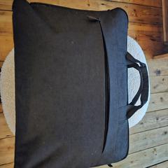 Black laptop sleeve, as reported to iLost