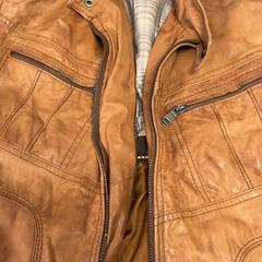 Leather coat, as reported by Dijkpop Festival using iLost