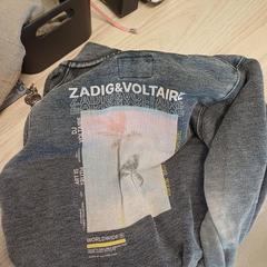 Gillet enfant gris, come riportato da IKEA Liège utilizzando iLost