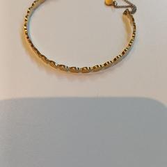 Armband goudkleurig, gemeldet von Gemeente Heusden über iLost