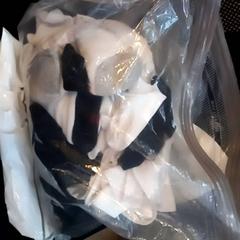 Laundry bag with several clothes, som rapportert av Leonardo Royal Hotel Amsterdam ved bruk av iLost