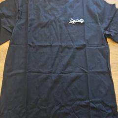 T-shirt, zoals gemeld door Liquicity Festival met iLost