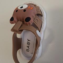 Children's shoe Bruin met beer motief op kinderschoen, as reported by Regio West-Vlaanderen using iLost