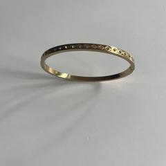 Armband goudkleurig, as reported to iLost