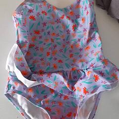 Costumi da bagno Paars, bloemen, come riportato da Dolfinarium utilizzando iLost