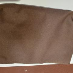 Bolso de embrague marron, ha sido reportado por TCL con iLost