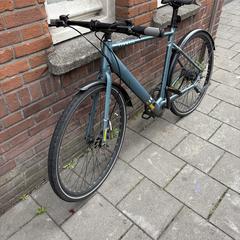 Licht blauwe Tenways fiets, come riportato a iLost