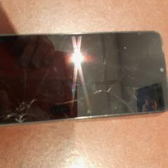 Mobiltelefon noir REDMI, som rapportert av TCL ved bruk av iLost