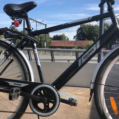 Bicicleta masculina Zwart merk Tounis, segundo informou Fietsdepot Diepenbeek usando iLost