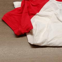 T-shirt rood en wit met opschrift, as reported by Festivals Werchter using iLost