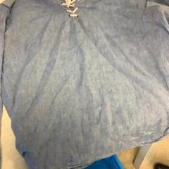 Blusa, como reportado por Artis utilizando o iLost