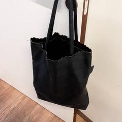 Saco de pano Donker blauw leer, como reportado por Qbuzz ZHN utilizando o iLost
