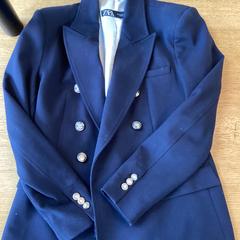 Blazer zara, come riportato da Stad Hasselt utilizzando iLost