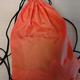 Oranje nylon tas met sportkleding, zoals gemeld door Connexxion Zeeland met iLost