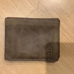 Wallet Op naam van Calis, as reported by Gemeente Amsterdam using iLost