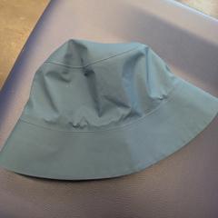 Bucket Hat blauw/groen, come riportato a iLost