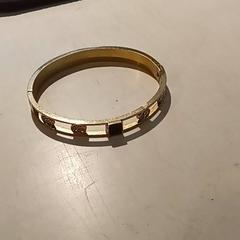 Armband Goudkleurige armband, zoals gemeld door Pukkelpop Camping Chill met iLost