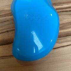 Hårbørste Blau-Rosa Tangle Teezer, som rapportert av Wilmering Vechta ved bruk av iLost