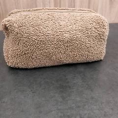 Borsa da toilette, come riportato da Rotterdam The Hague Airport utilizzando iLost