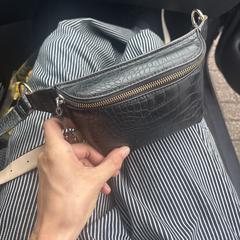 Black purse or bag, from Coach, som rapporterats till iLost