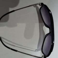 Gafas de sol noire, ha sido reportado por TCL con iLost