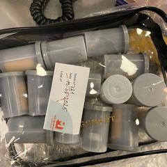 Camera rolls in a black and transparent toilet bag, jak nahlášeno MEININGER Hotel Bruxelles Gare du Midi pomocí iLost