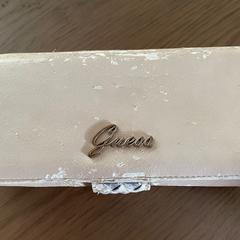 Beige portemonnee, gerapporteerd met iLost