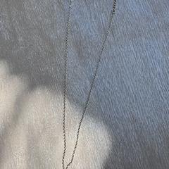 Een goudkleurige ketting met 2 initialen, iLost에 보고됨